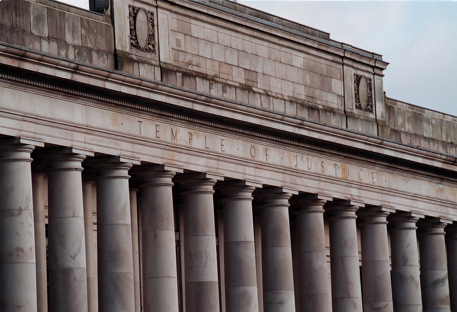 The Doric columns of the Temple of Justice, which contains the chambers and offices of the State Supreme Court.