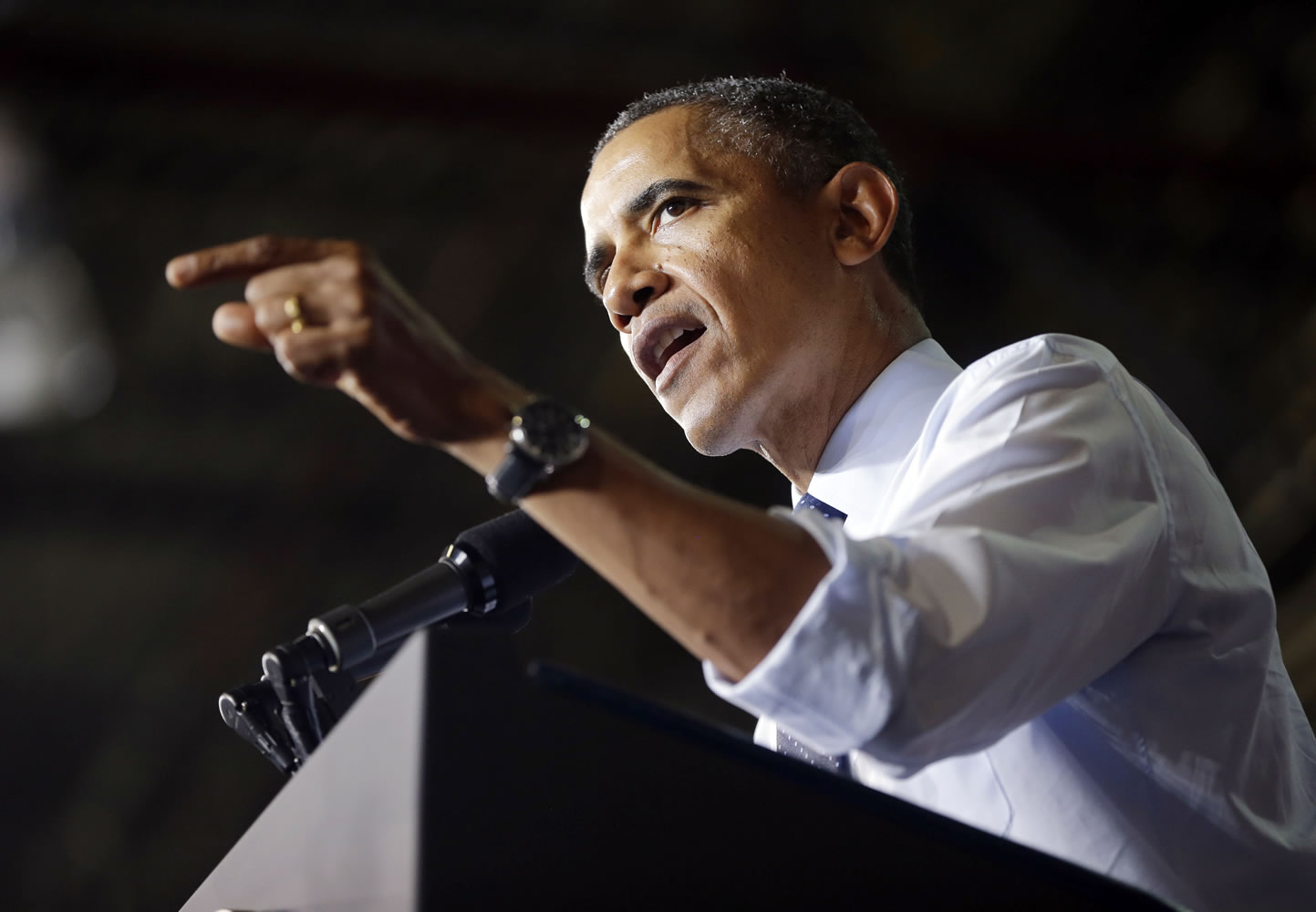 President Barack Obama gestures as he speaks to workers Friday at the Ford Kansas City Stamping Plant in Liberty, MO.