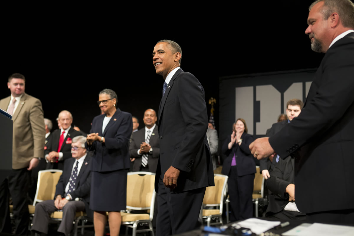 President Barack Obama is applauded as he arrives to speak at the Disabled American Veterans National Convention in Orlando, Fla.,  on Saturday.