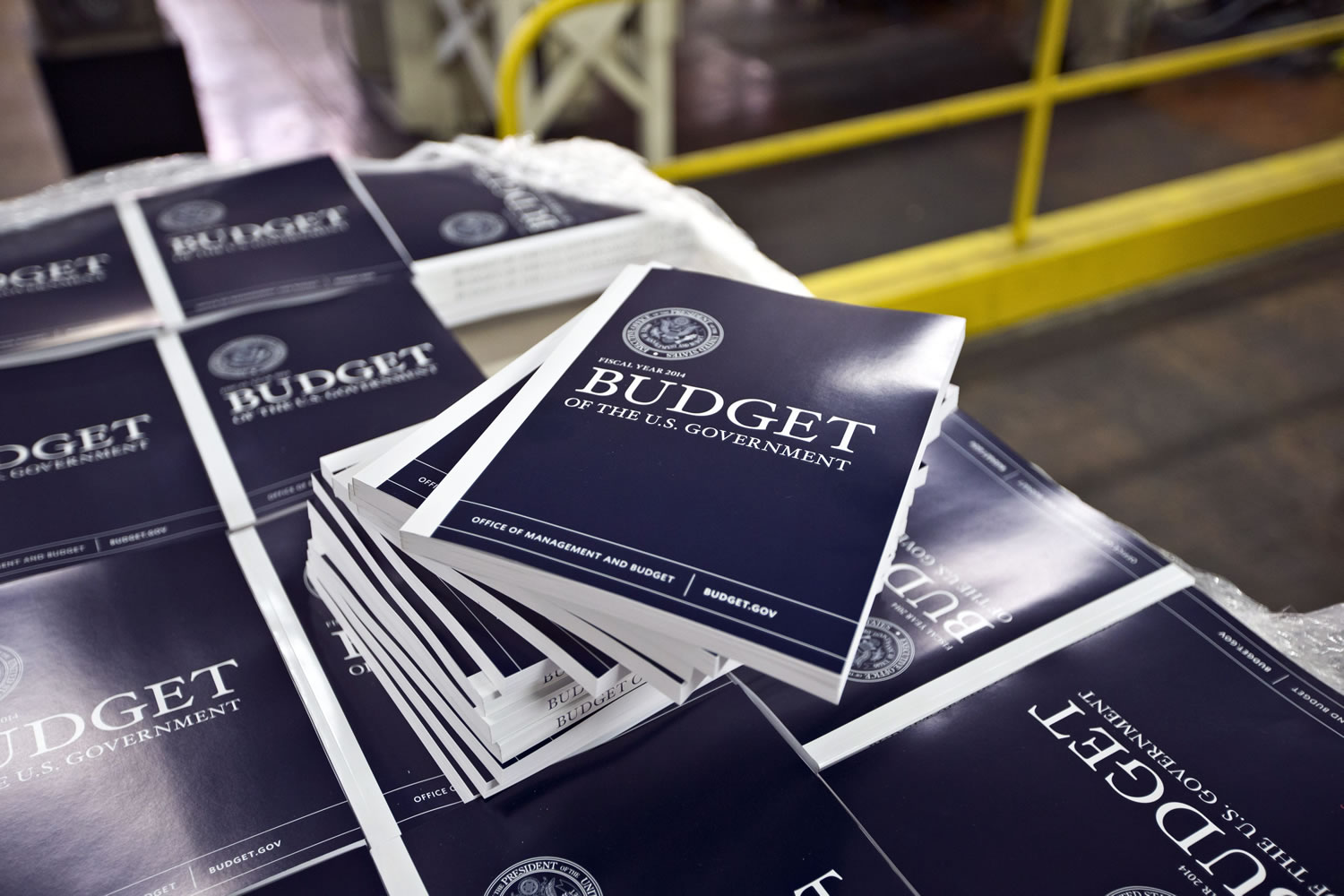 Copies of President Barack Obama's budget plan for fiscal year 2014 are prepared for delivery Monday at the U.S. Government Printing Office in Washington.