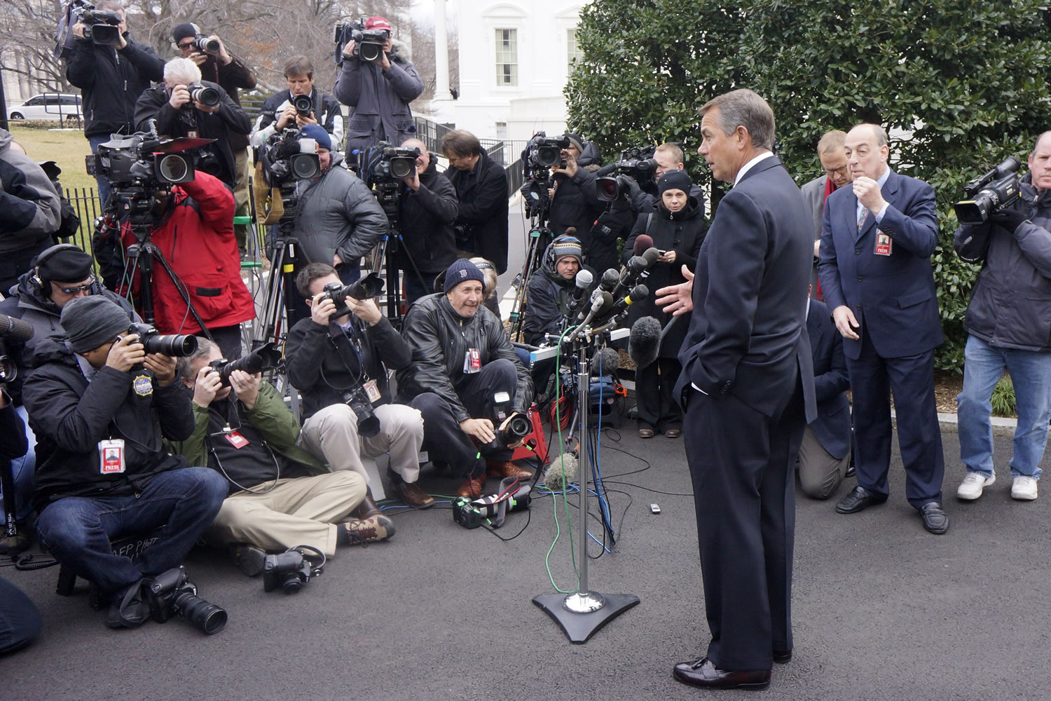 House Speaker John Boehner of Ohio talks to reporters outside the White House in Washington, Friday, March 1, 2013, following a meeting with President Barack Obama and Congressional leaders regarding the automatic spending cuts.
