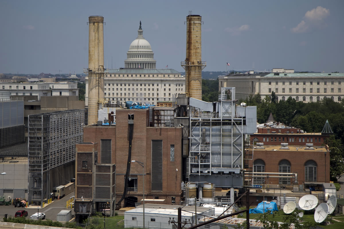 The Capitol Dome is seen behind the Capitol Power Plant in Washington on Monday.