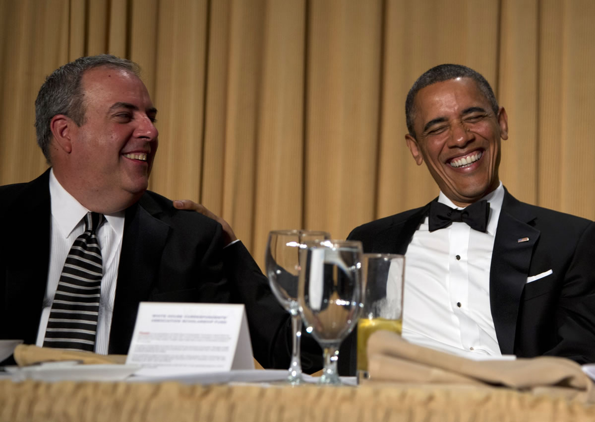 President Barack Obama laughs with Michael Clemente, Executive Vice President of Fox News, during Conan O'Brien speech Saturday at the White House Correspondents' Association Dinner at the Washington Hilton Hotel in Washington.