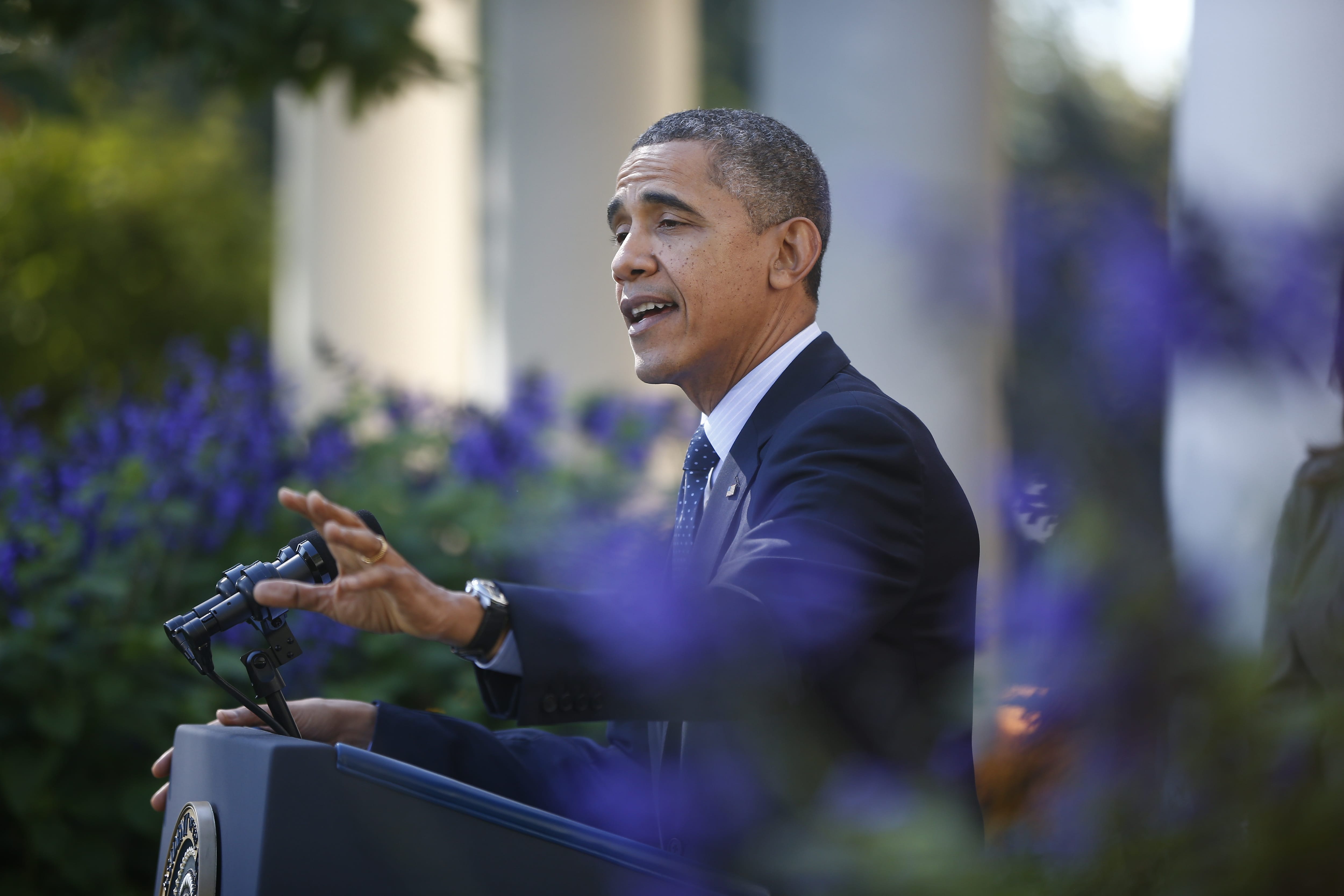 President Barack Obama speaks during an event in the Rose Garden of the White House on the initial rollout of the health care overhaul on Monday in Washington.