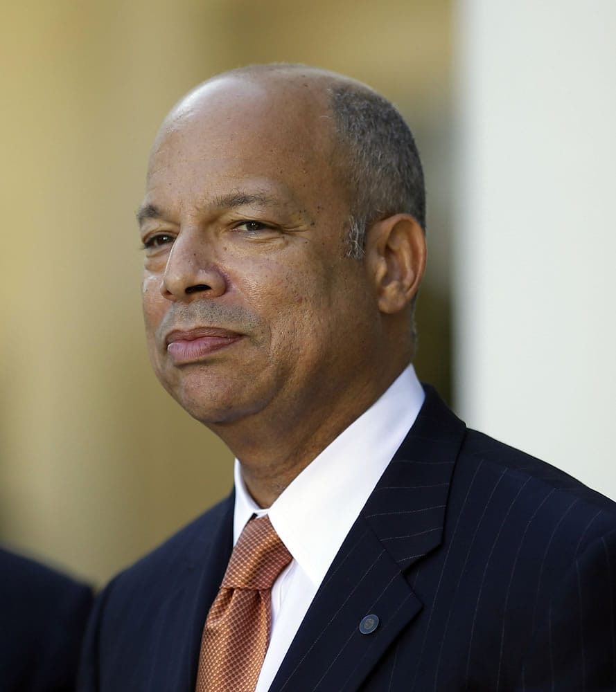Jeh Johnson, President Barack Obama's choice for the next Homeland Security Secretary, watches in the Rose Garden at the White House in Washington, Friday, Oct. 18, 2013.