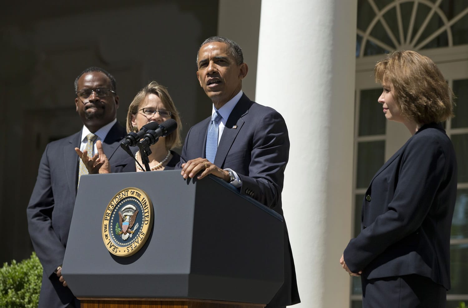 President Barack Obama speaks in the Rose Garden of the White House in Washington on Tuesday to announced the nominations of, from left, Robert Wilkins, Cornelia Pillard and Patricia Ann Millet to the federal appeals court in Washington.