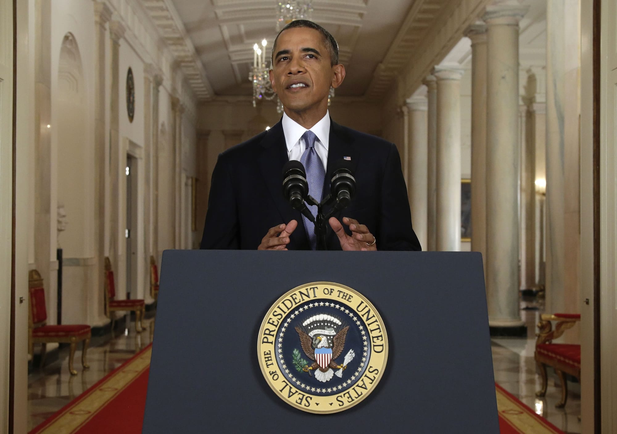 President Barack Obama addresses the nation in a live televised speech from the East Room of the White House in Washington, Tuesday, Sept. 10, 2013. President Obama blended the threat of military action with the hope of a diplomatic solution as he works to strip Syria of its chemical weapons.