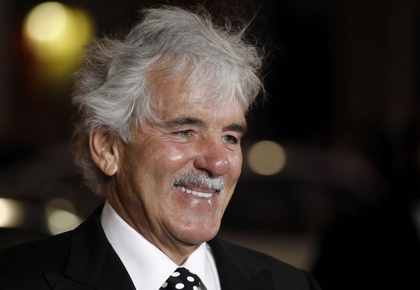 Dennis Farina arrives at the premiere for the HBO television series &quot;Luck&quot; in Los Angeles. Farina died suddenly  Monday in Scottsdale, Ariz., after suffering a blood clot in his lung.