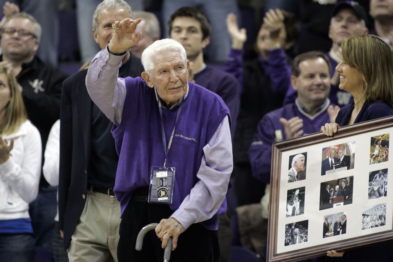 Former Washington head coach Marv Harshman acknowledges the crowd during a halftime ceremony in his honor on Nov. 14, 2009, at Hec Edmundson Pavilion in Seattle. Harshman, who spent 40 years coaching in the state of Washington, did Friday, April 12, 2013, the University of Washington said.