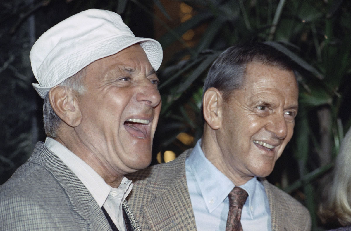 Jack Klugman, left, and Tony Randall laugh at a 1992 news conference announcing that they would reprise their most famous roles as Oscar Madison and Felix Unger respectively, for a one-night benefit performance of &quot;The Odd Couple.&quot;