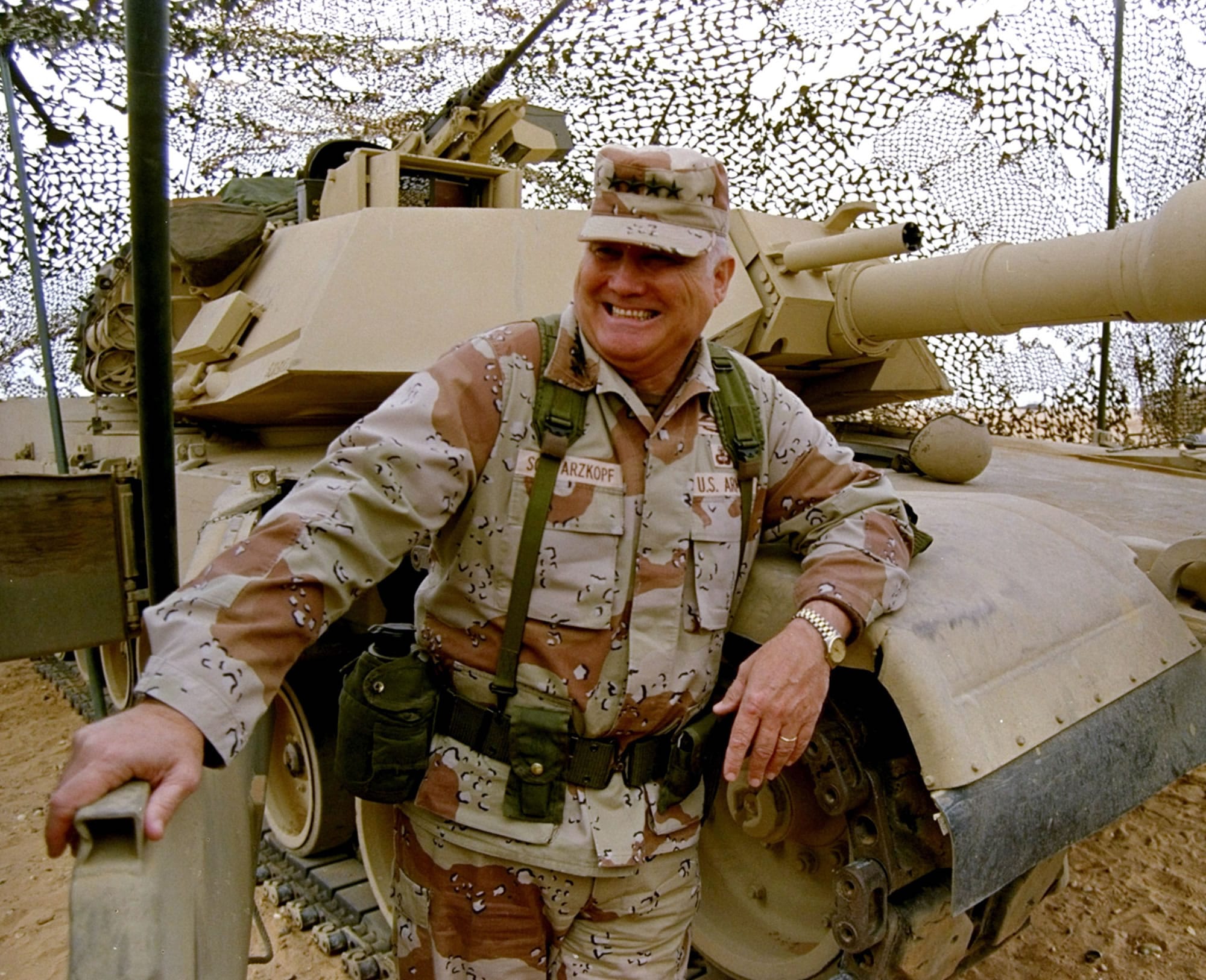Gen. H. Norman Schwarzkopf stands at ease with his tank troops Jan. 12, 1991 during Operation Desert Storm in Saudi Arabia. Schwarzkopf died Thursday in Tampa, Fla.