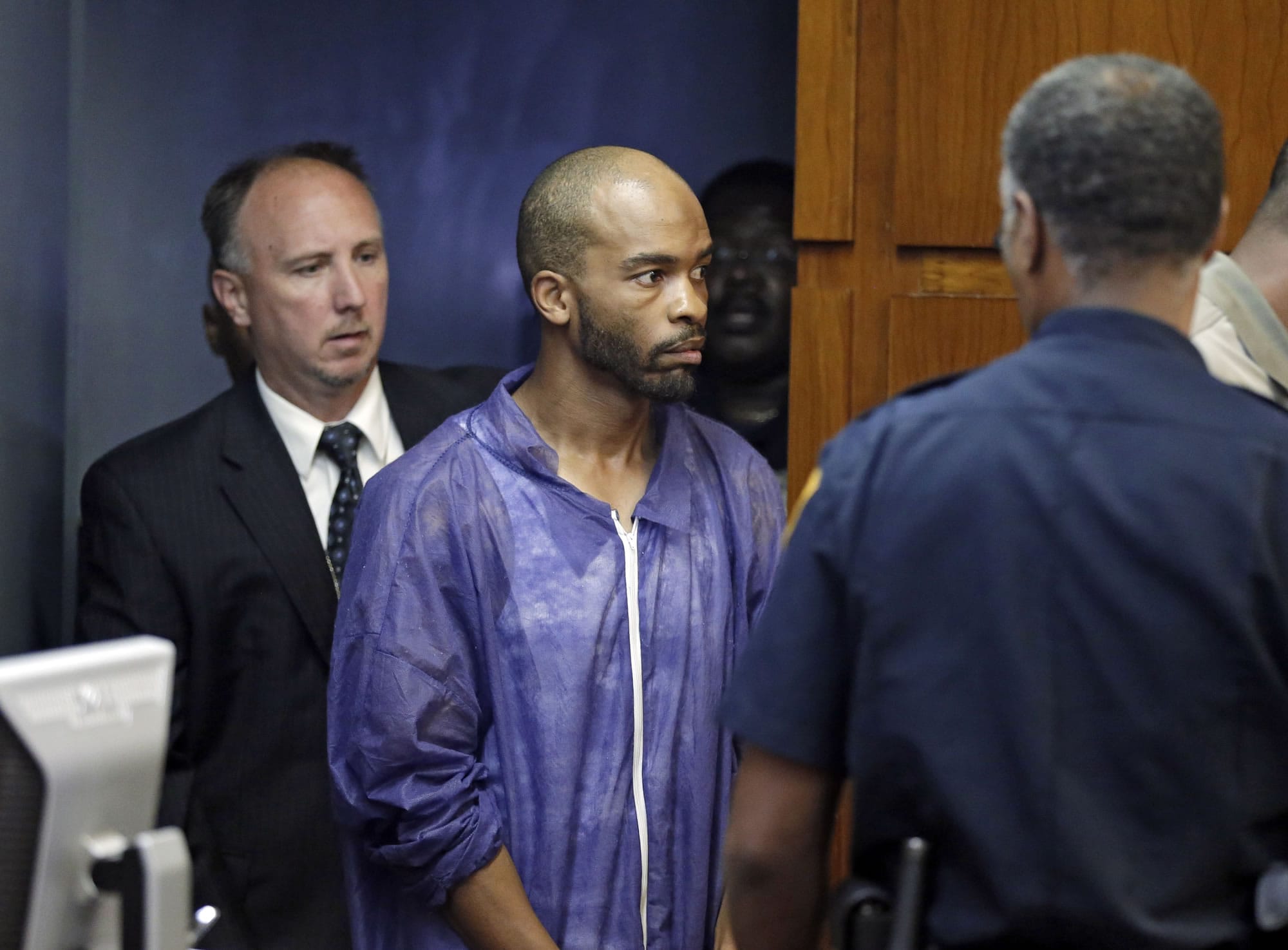 Michael Madison is brought into court for his arraignment in East Cleveland, Ohio.