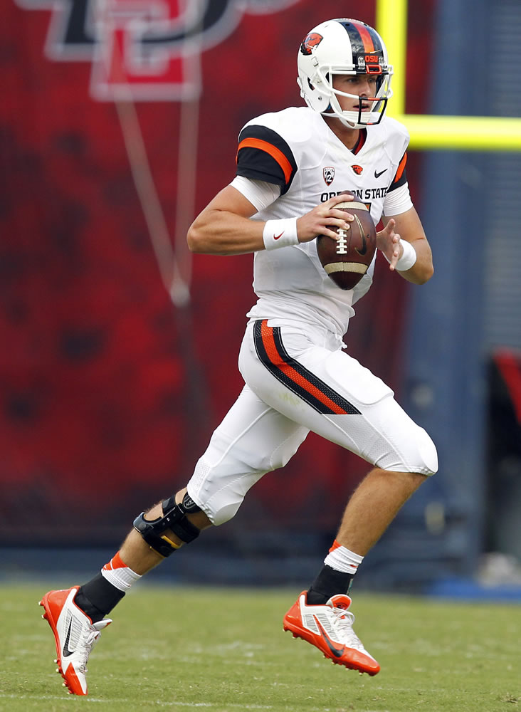 Oregon State quarterback Sean Mannion completed 38 of 55 attempts for 367 yards and three touchdowns as the Beavers beat San Diego State 34-30 on Saturday.