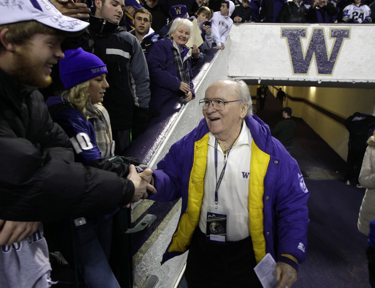 Former University of Washington football coach Don James greets fans Nov. 5, 2011 prior to an NCAA college football game against Oregon, in Seattle. James, the longtime Washington football coach who led the Huskies to a share of the national championship in 1991, died Sunday.