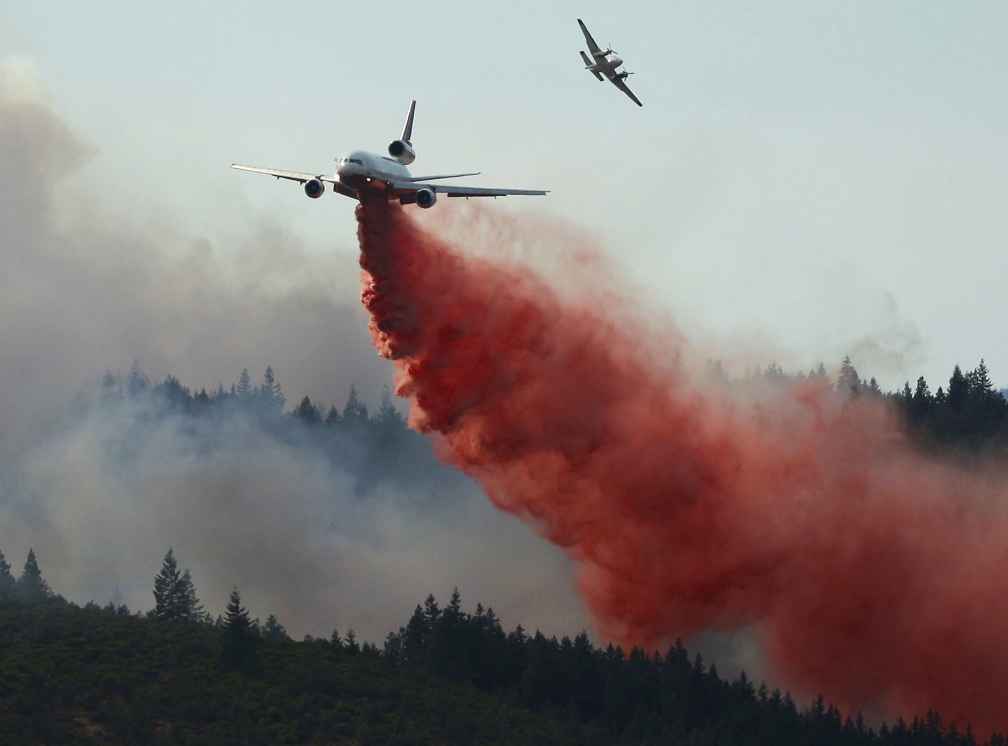 A DC-10 air tanker dropping fire retardant on the Powerline Fire in 2011 near Warm Springs, Ore.
