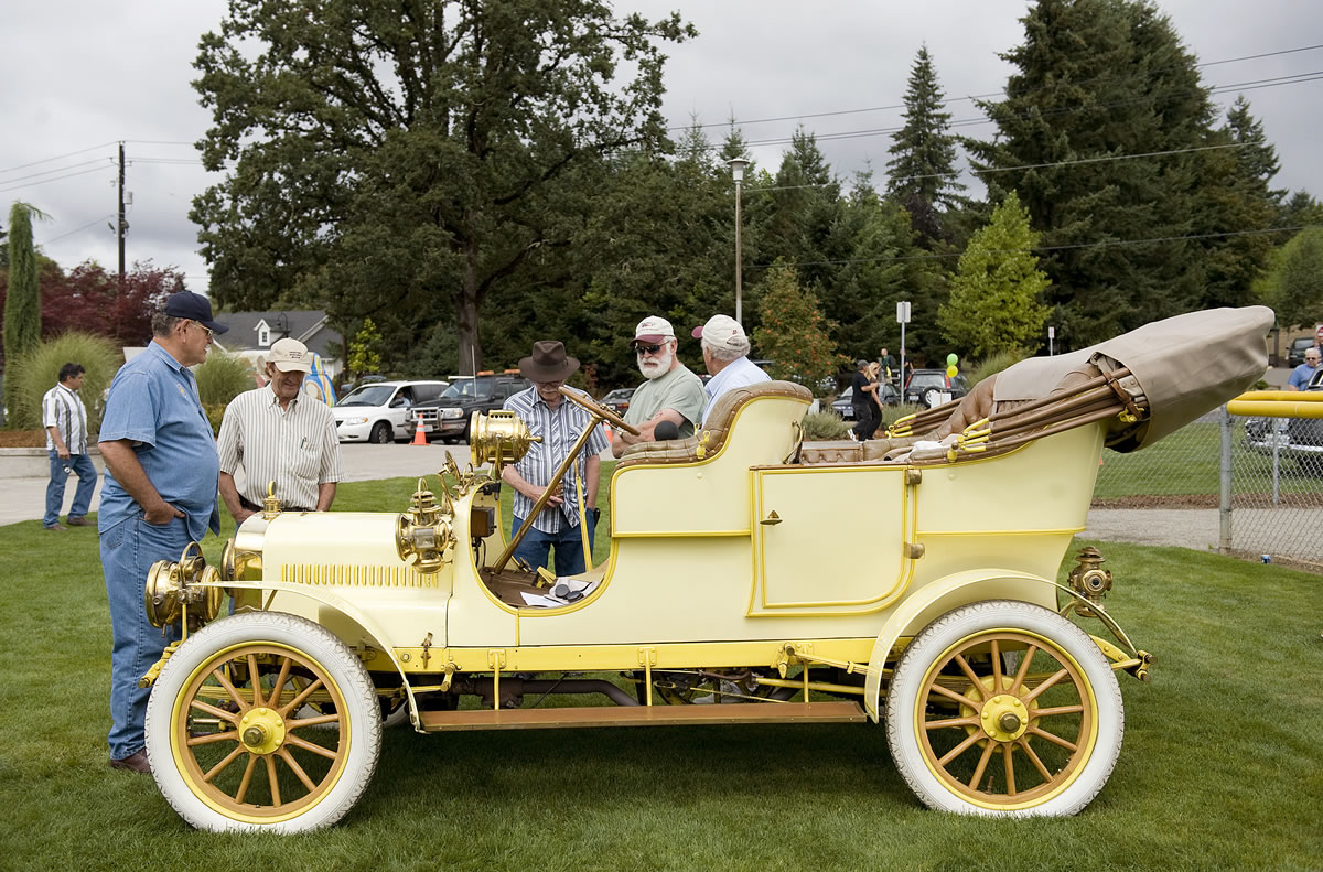 Frank Hurley, left, from Vancouver, shows off his 1907 Cartercar at the La Center Centennial Celebration car show in 2009.