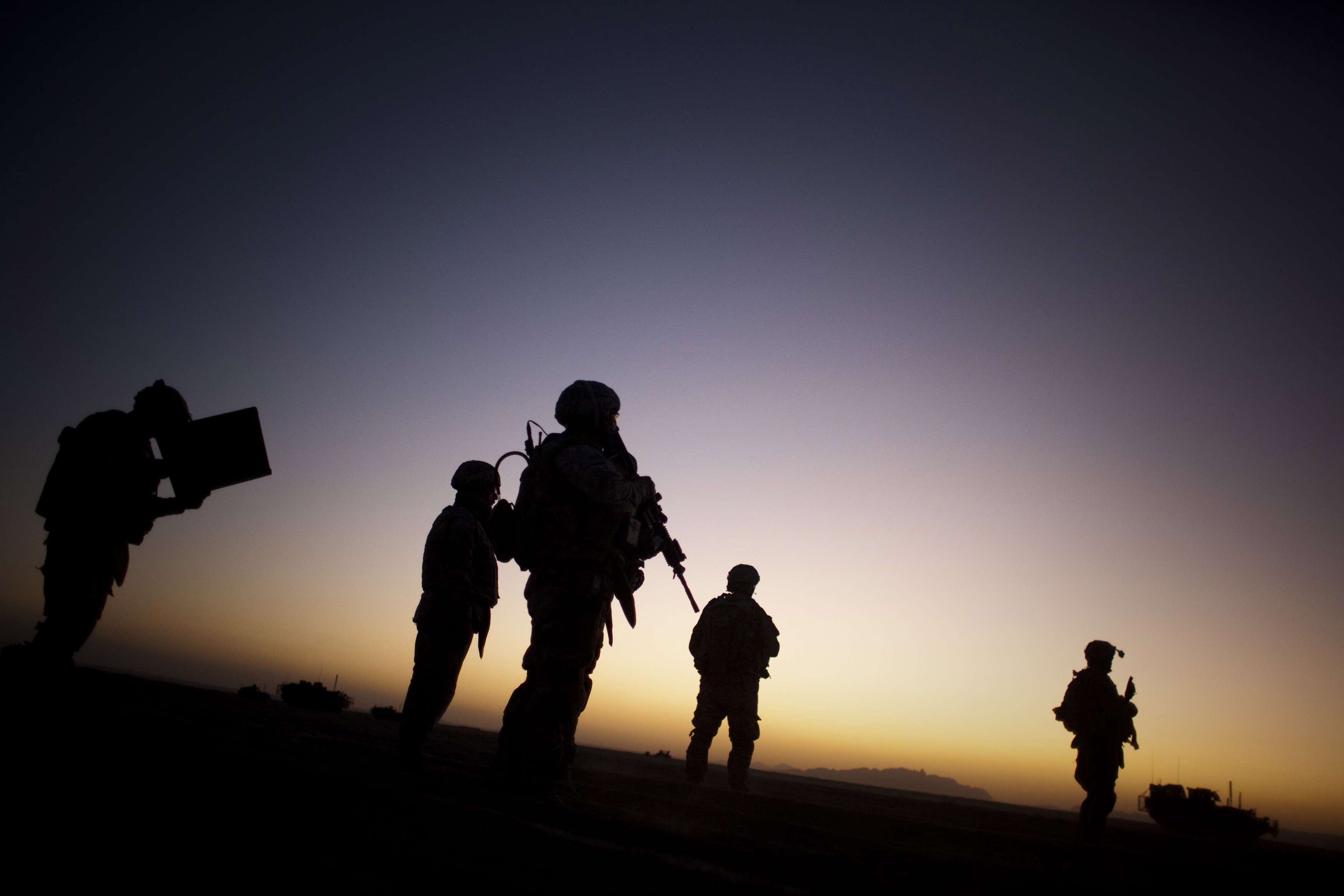 U.S. soldiers patrol the outskirts of Spin Boldak, near the border with Pakistan, about 63 miles southeast of Kandahar, Afghanistan, in 2009. The U.S.