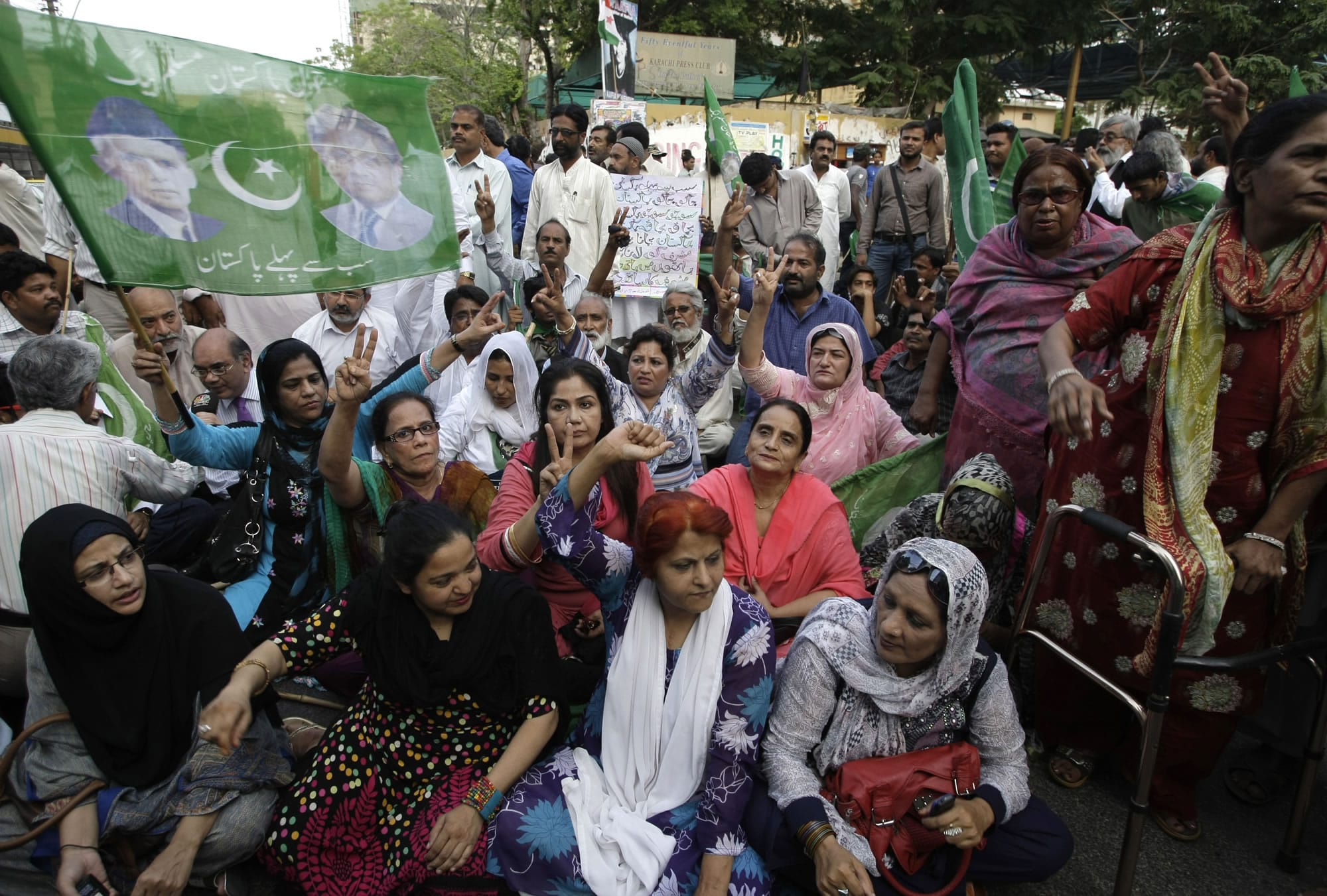Supporters of Pakistan's former President and military ruler Pervez Musharraf rally against the court decision in Karachi, Pakistan on Thursday.