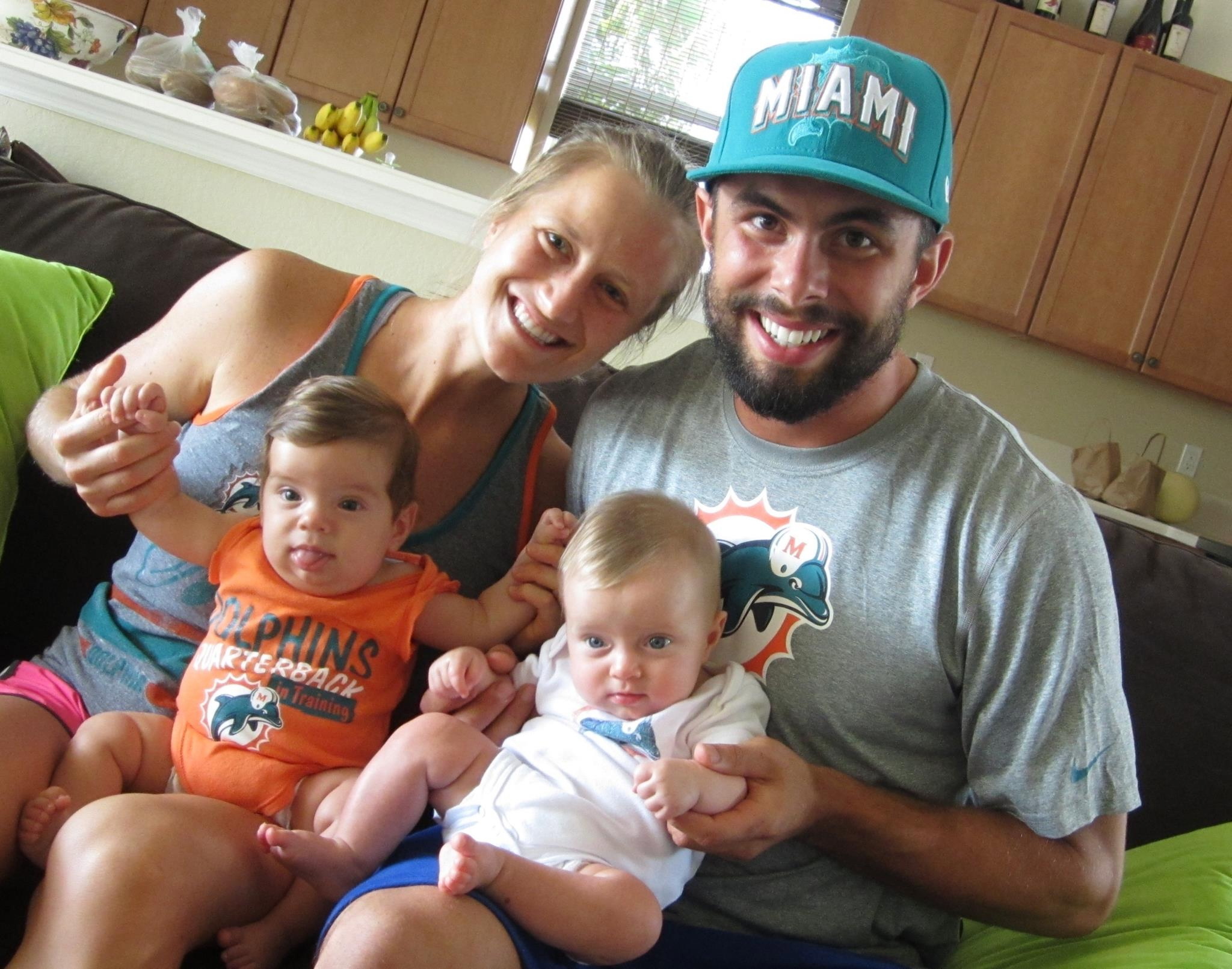 Laura Radocaj shares household and child-rearing duties with her husband, Marco They are holding their twins, Rudy, left, and Ryan in Vero Beach, Fla.
