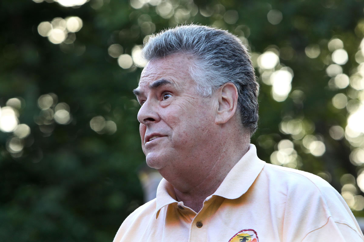 U.S. Rep. Pete King, R-N.Y. speaks at an outdoor barbecue at the home of Don Rowan on Sunday in Wakefield, N.H.