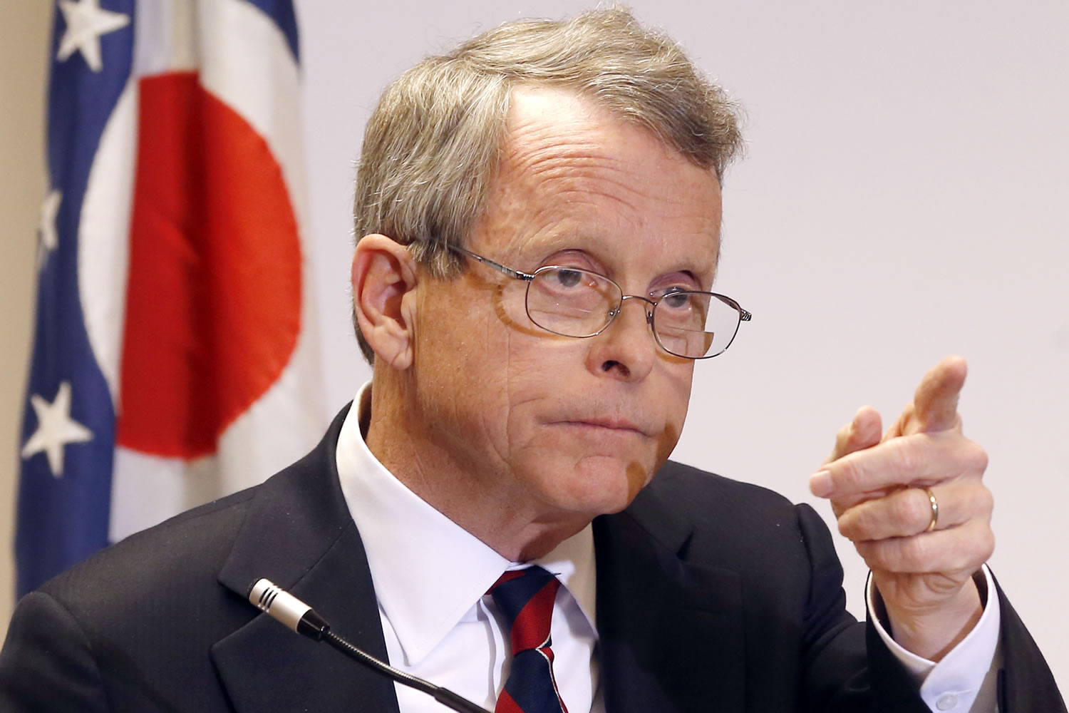 FILE - In this Monday, Nov. 25, 2013 file photo, Ohio Attorney General Mike DeWine answers questions during a news conference in Steubenville, Ohio. Attorney General Mike DeWine on Friday, Dec. 11, 2015, criticized the agency for disposing of fetal remains in landfills.
