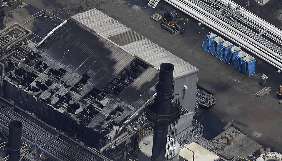 Melted portable toilets are seen at a chemical plant fire in this aerial photo about 20 miles southeast of Baton Rouge, in Geismer, La., on Thursday.