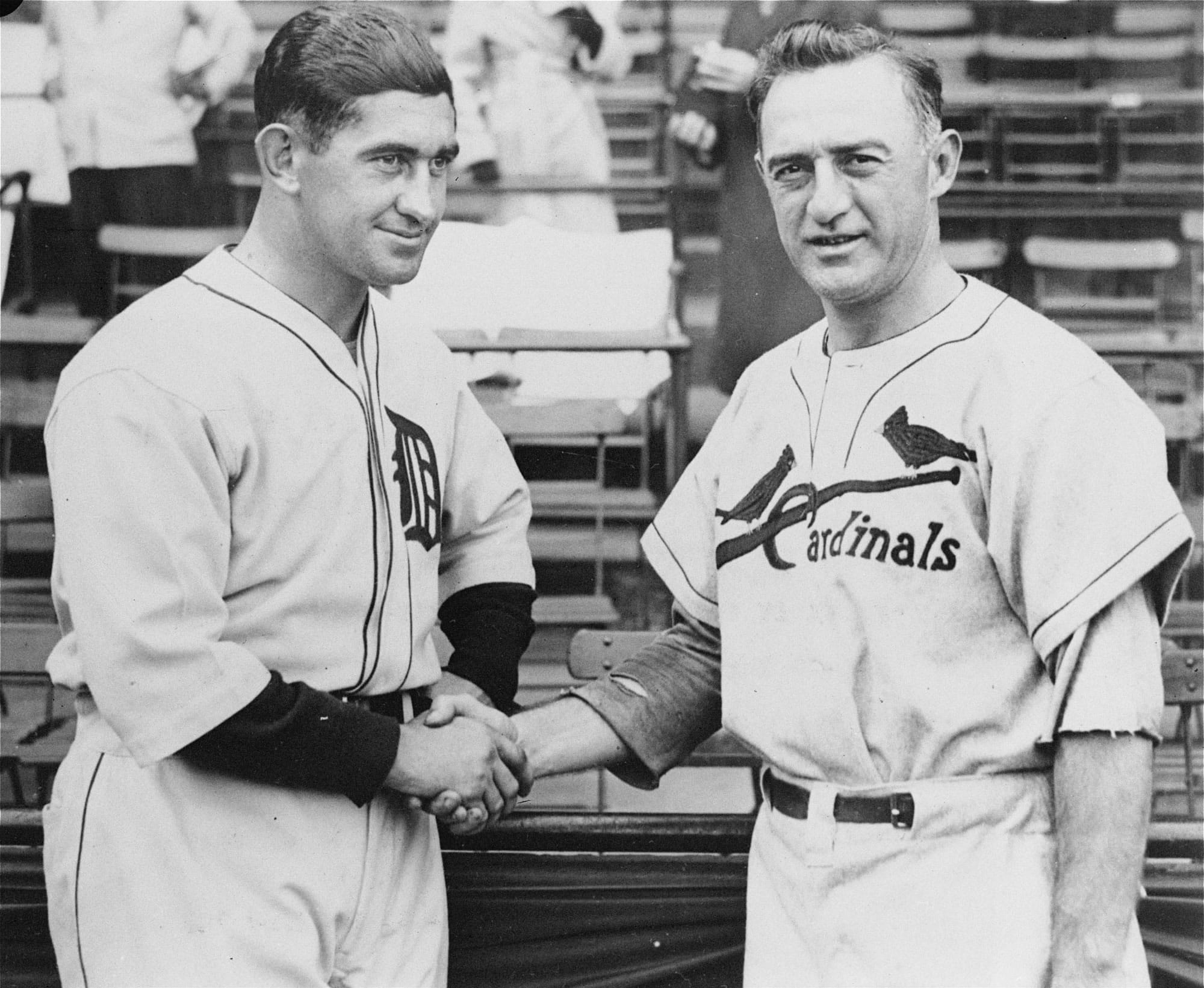 Associated Press
Detroit Tigers manager Mickey Cochrane, left, and St. Louis Cardinals manager Frankie Frisch shake hands Oct. 3, 1934 before the start of the opening game of the World Series in Detroit. The classic &quot;birds on a bat&quot; logo sported by Carlos Beltran and his St. Louis teammates, the Olde English &quot;D&quot; worn by Miguel Cabrera and his Detroit pals -- find a picture from the 1934 World Series between those teams and you'll recognize the jerseys.