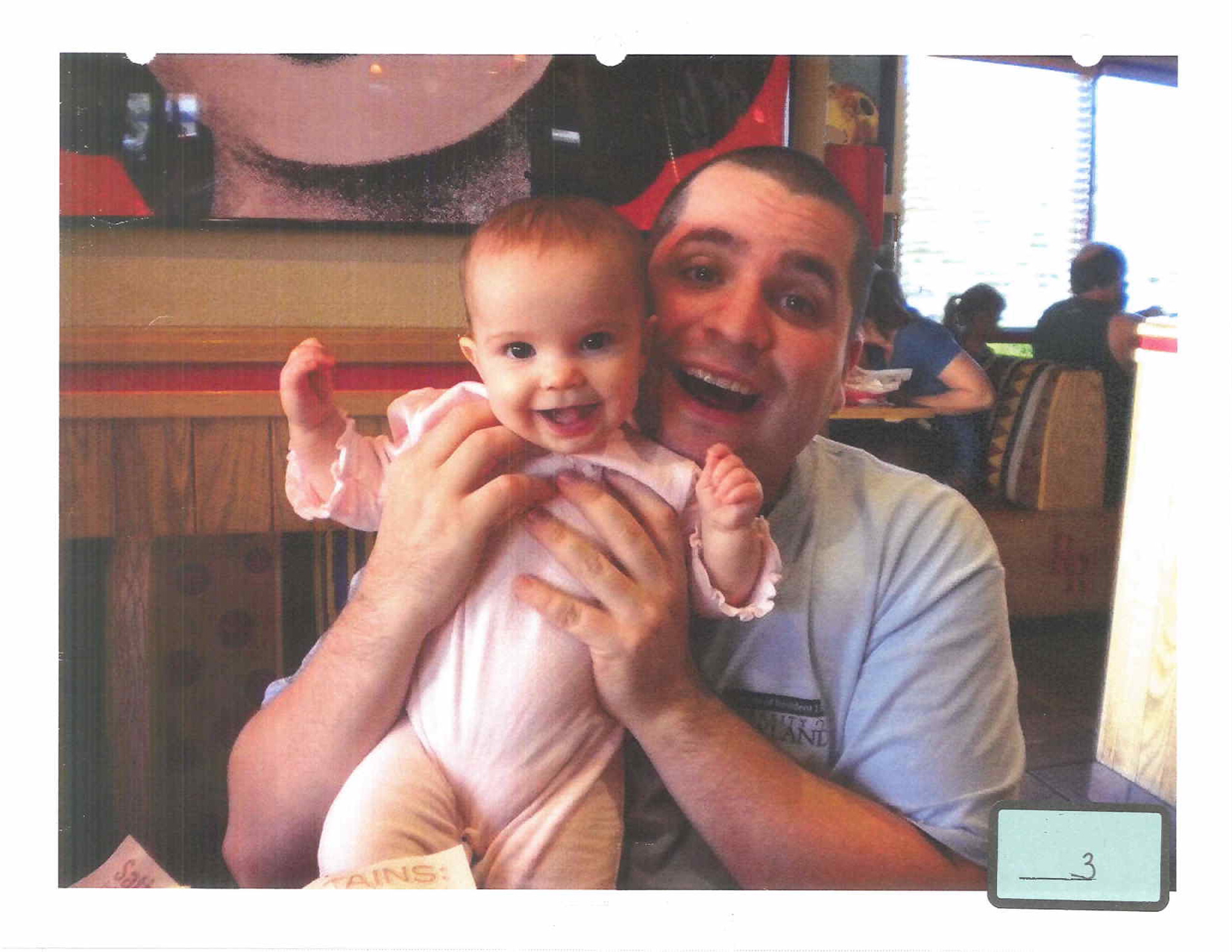 This undated photo submitted into evidence by defense attorney Julia L. Gatto shows New York City police Officer Gilberto Valle with his daughter.