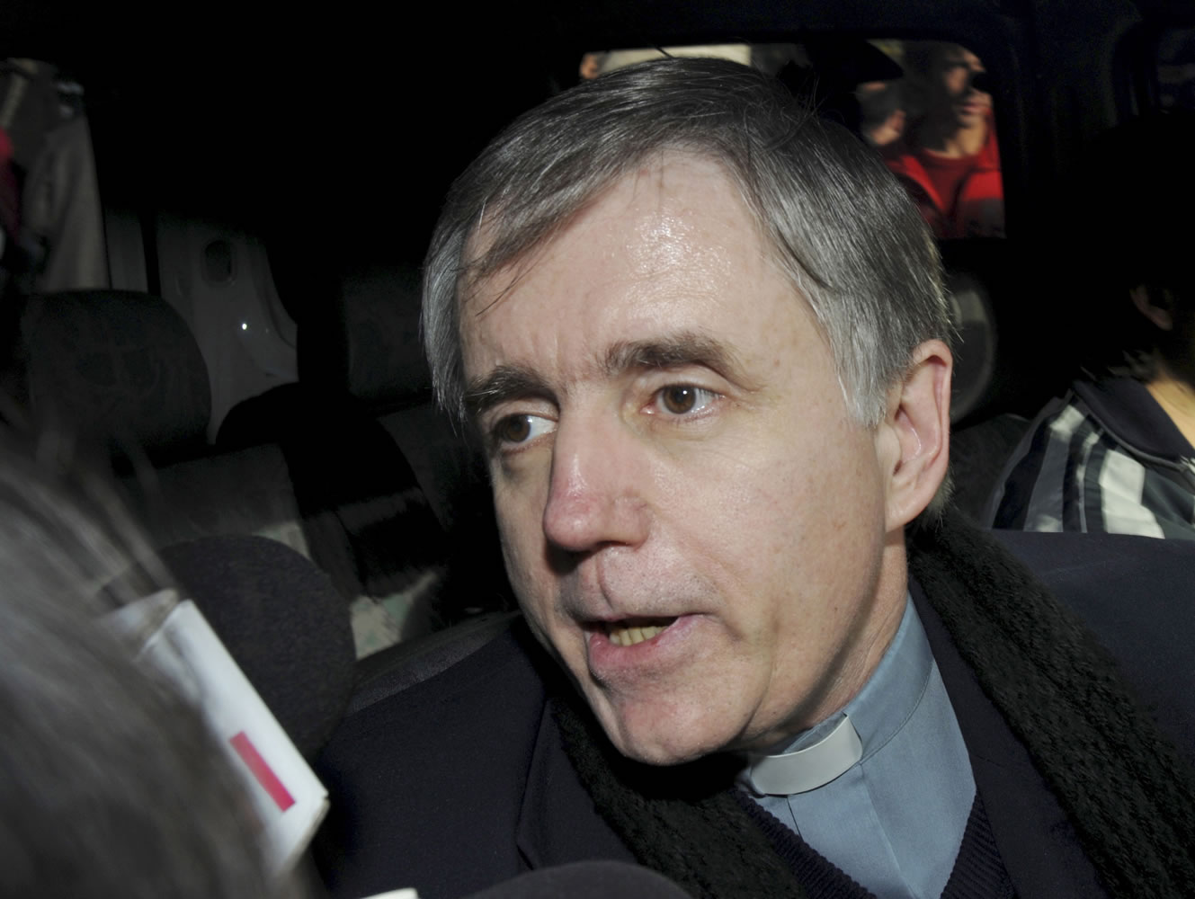 Argentine Catholic priest Julio Grassi talks to reporters as he leaves a courthouse after being found guilty of sexual abuse in Buenos Aires, Argentina, in 2009.