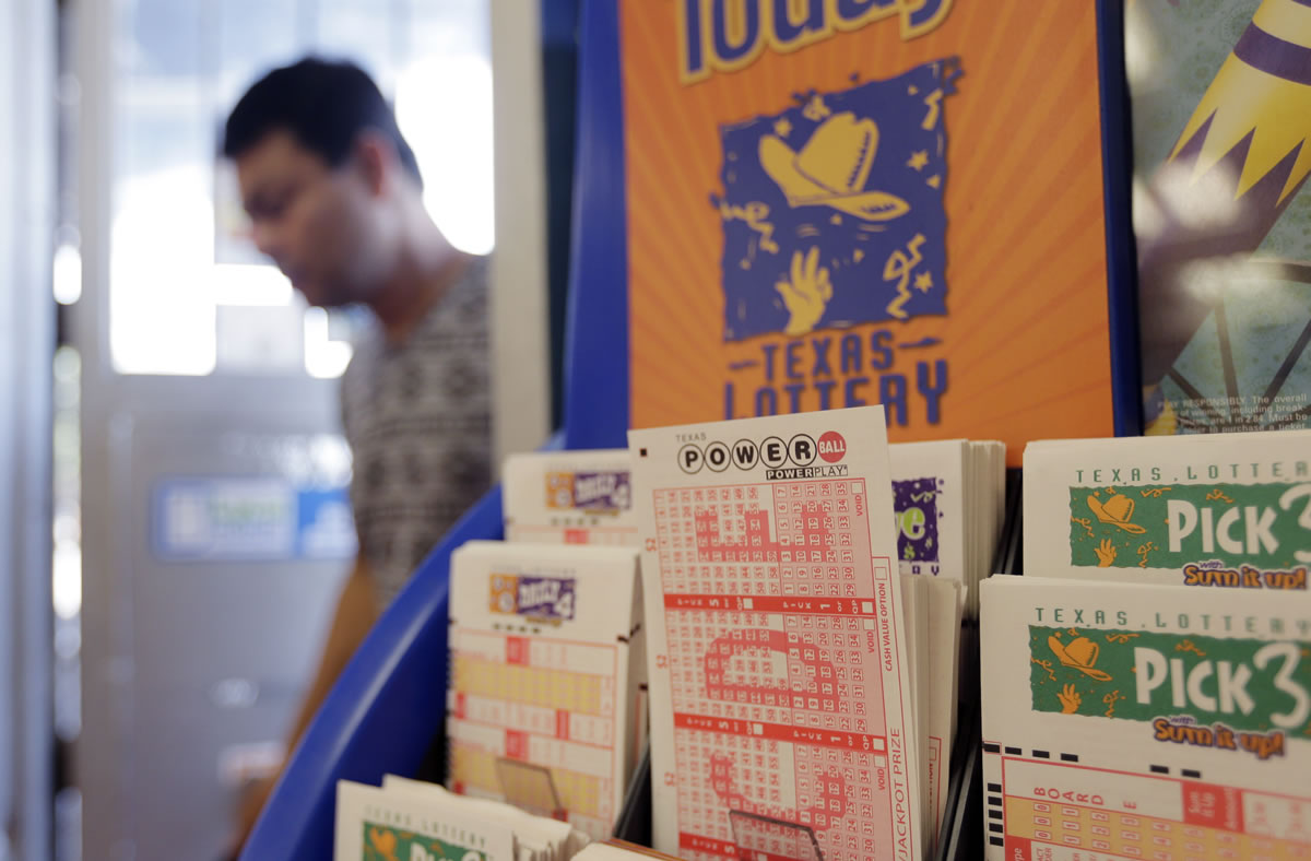 Powerball lottery forms are seen Wednesday in San Antonio.