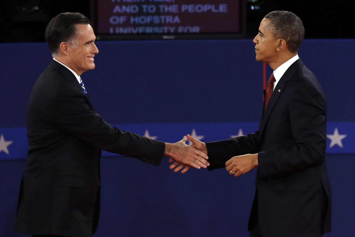 Republican presidential nominee Mitt Romney  and President Barack Obama shake hands after the second presidential debate at Hofstra University, Tuesday, Oct. 16, 2012, in Hempstead, N.Y.