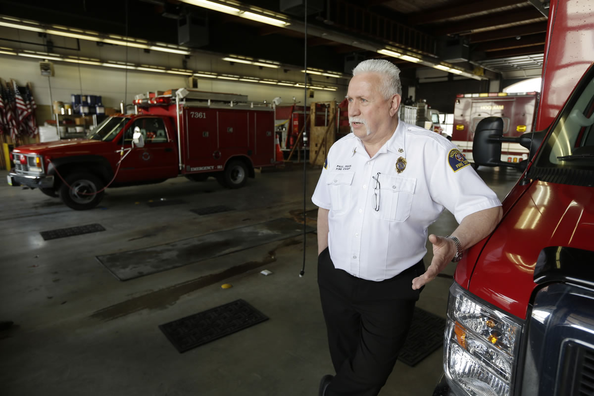 Paul Dean, fire chief in Hoquiam, stands in the garage where the city's new ladder truck will be parked when it arrives.