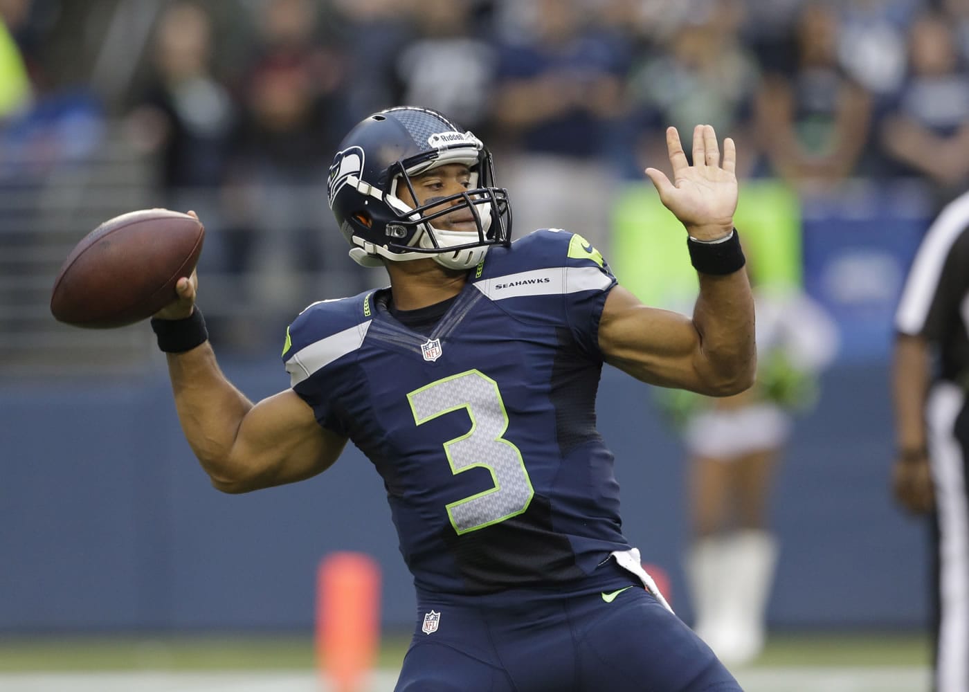 Seahawks starting quarterback Russell Wilson leads a roster of young players into the NFL season today against the Carolina Panthers.