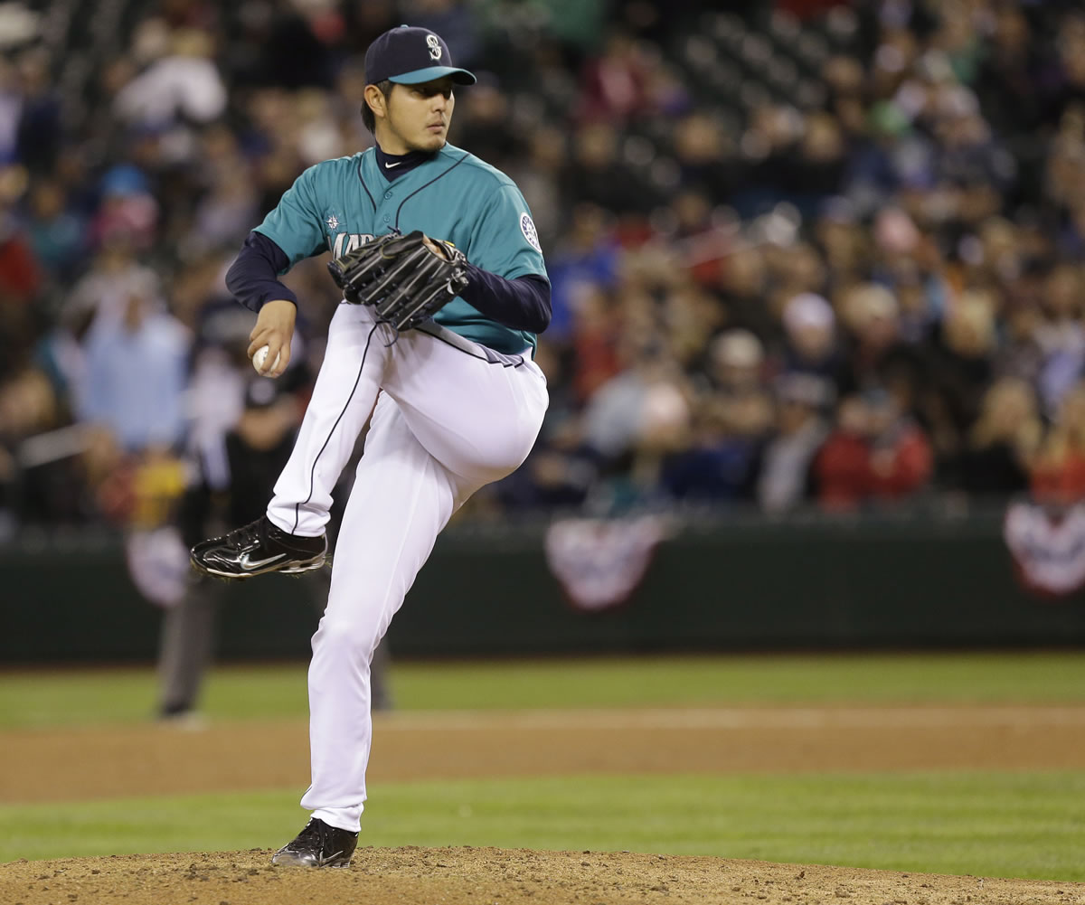 Seattle Mariners starting pitcher Hisashi Iwakuma left with two outs in the seventh after throwing 90 pitches, giving up just three hits and striking out six.