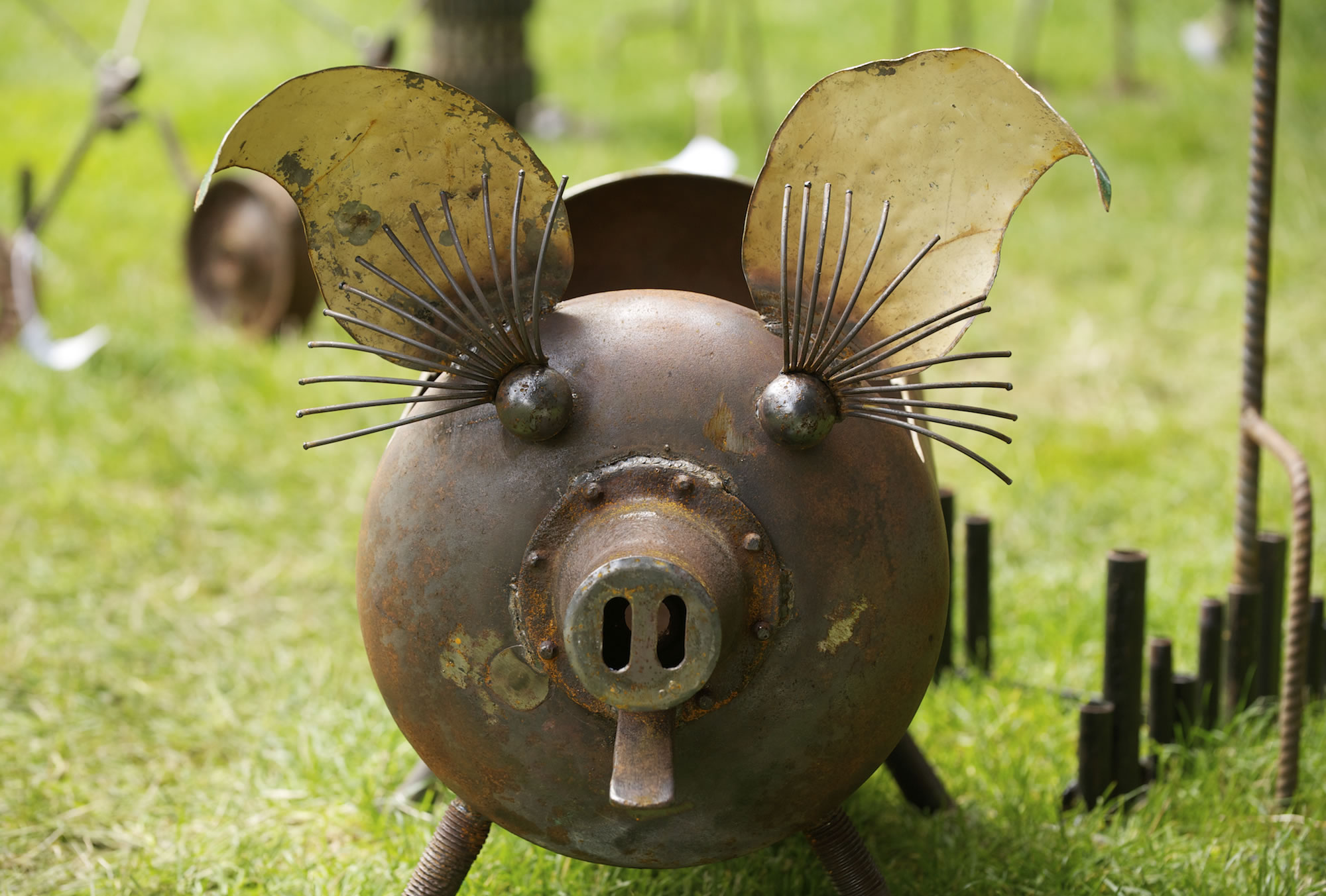 Artwork at the 2012 Recycled Arts Festival included a pig made from recycled metal by Cedar Creek Inc.