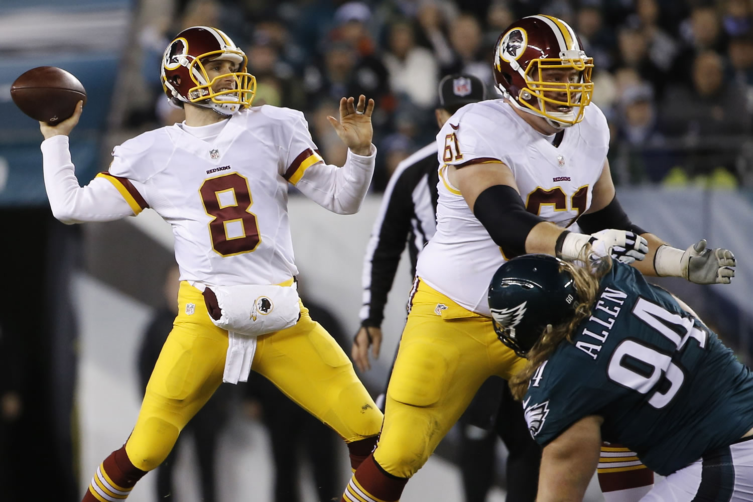Washington Redskins' Kirk Cousins looks to pass in the first half of an NFL football game against the Philadelphia Eagles, Saturday, Dec. 26, 2015, in Philadelphia.