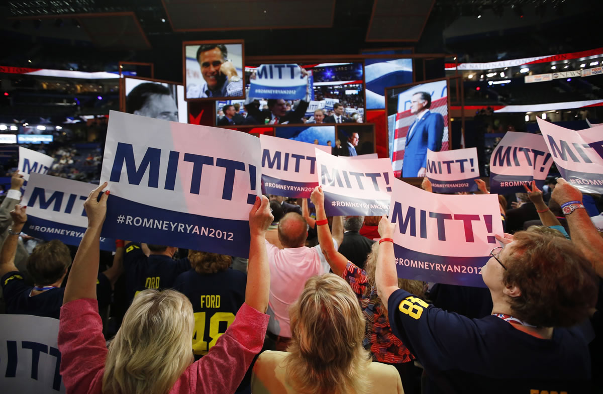 Delegates cheer as Mitt Romney is nominated for the Office of the President of the United States at the Republican National Convention in Tampa, Fla., on Tuesday, Aug. 28, 2012. (AP Photo/Jae C.