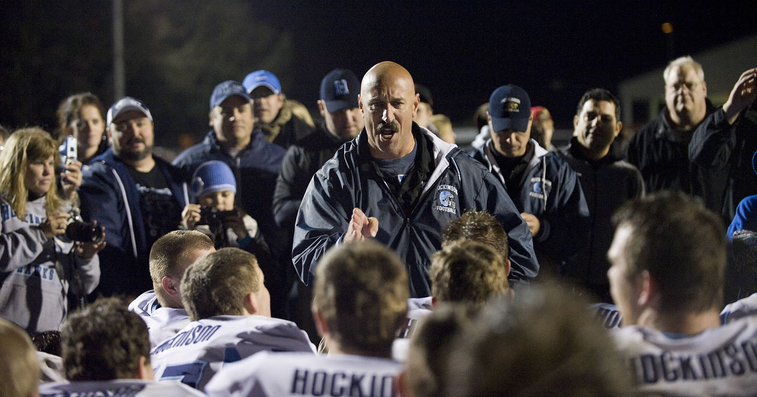 An emotional Hockinson head coach Rick Steele talks to his team after beating Woodland for the league title, Friday, October 21, 2011.