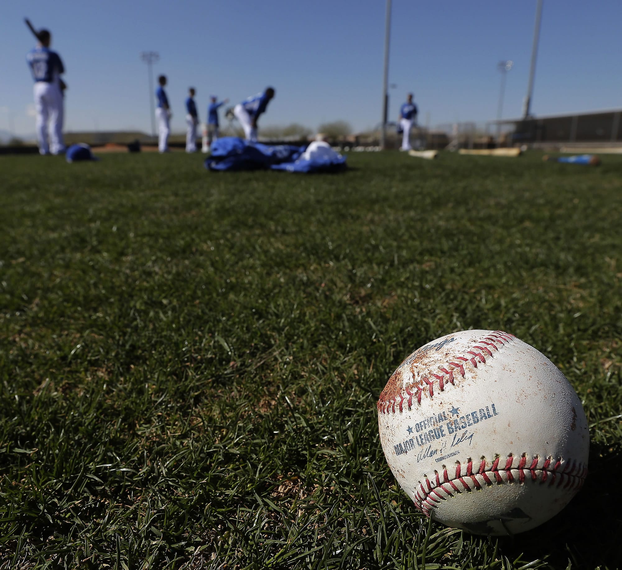 Players for the Kansas City Royals participate in a spring training baseball workout, Tuesday, Feb. 12, 2013, in Surprise, Ariz.