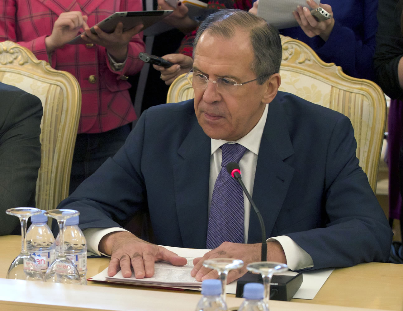 FILE- Russian Foreign Minister Sergey Lavrov, lays his hands on the table during talks with Thailand's Foreign Minister, not pictured, in Moscow, Russia, in this file photo dated  Thursday, March 28, 2013.  Lavrov on Friday April 5, 2013, is demanding an explanation for the North Korean warning that it canit guarantee the safety of embassies in its capital of Pyongyang in the event of a conflict, asking whether the warning is an order to evacuate their embassy or merely a suggestion that they should consider doing so. North Korea's government did not comment on the request for clarification.