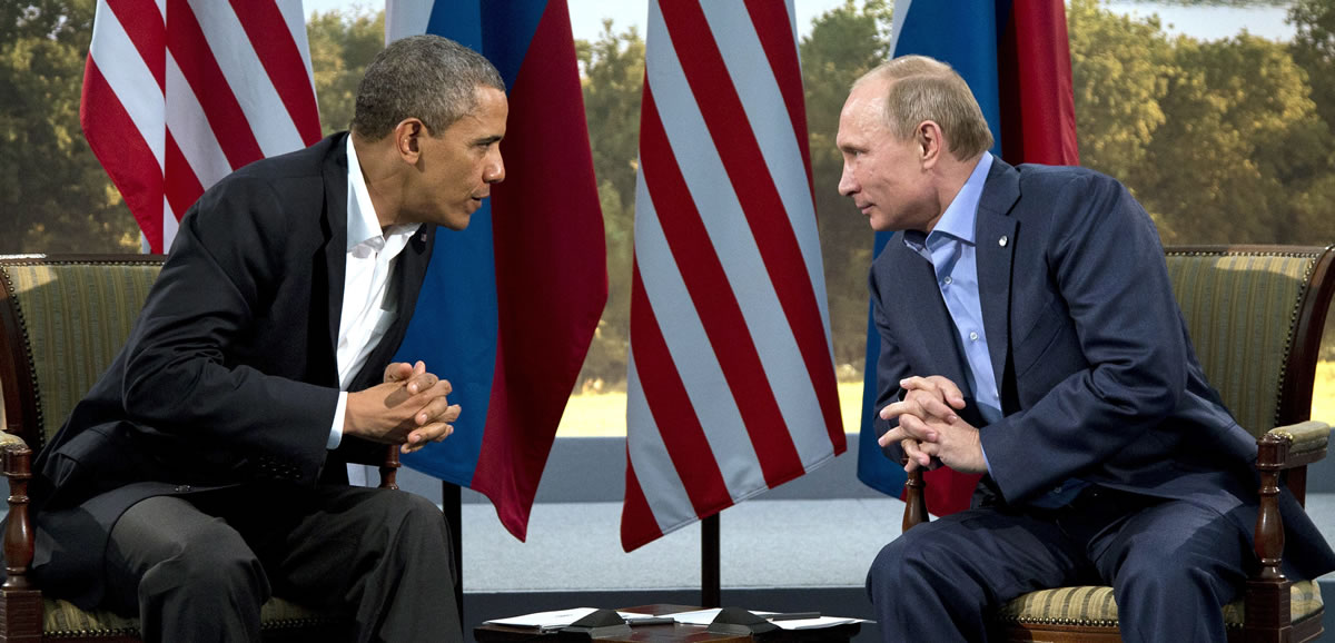 President Barack Obama speaks with Russian President Vladimir Putin in Enniskillen, Northern Ireland, in June.