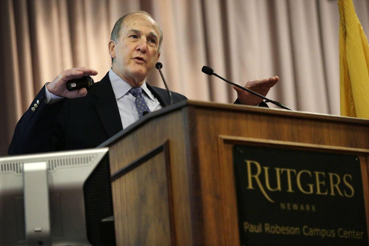 Rutgers University President Robert Barchi addresses a town hall meeting Monday in Newark, N.J.