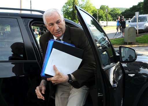 Former Penn State University assistant football coach Jerry Sandusky arrives for the fourth day of his trial at the Centre County Courthouse in Bellefonte, Pa., on Thursday.