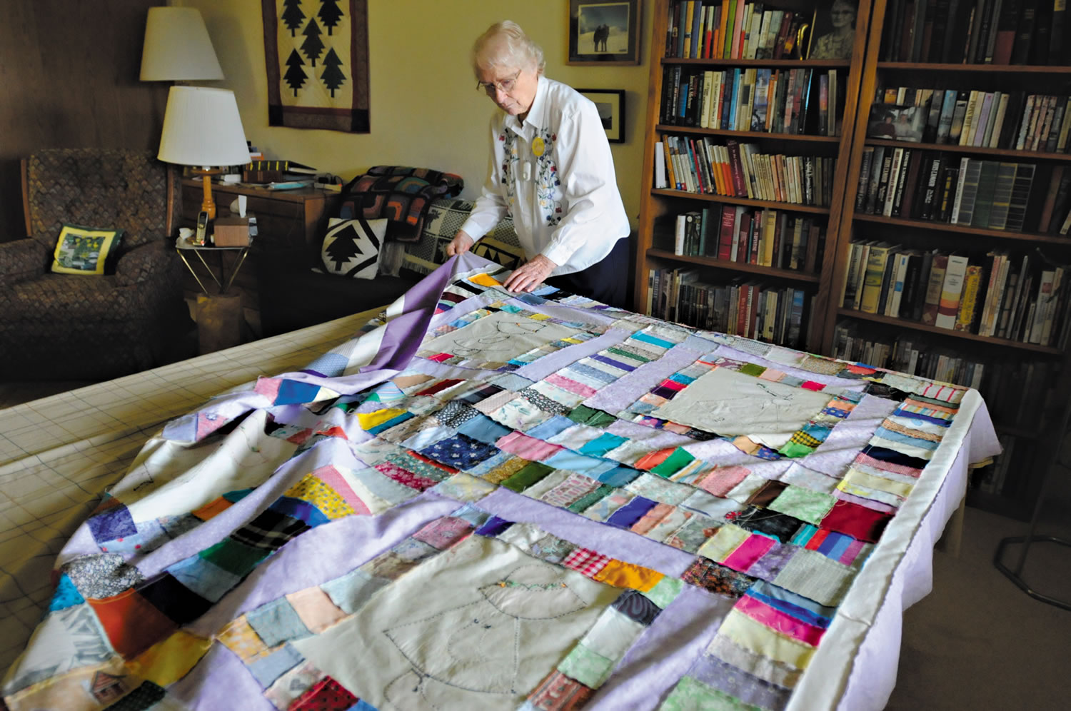 Eleanor Otley, a resident of The Regent in Corvallis, Ore., works on a quilt Feb. 1.