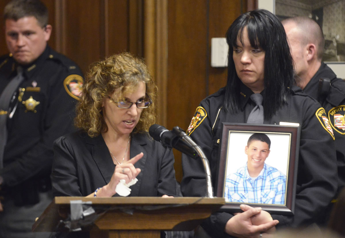 Dina Parmertor, mother of victim Daniel, speaks during the sentencing of T.J. Lane on Tuesday in Chardon, Ohio. Lane, was given three lifetime prison sentences without the possibility of parole Tuesday for opening fire last year in a high school cafeteria in a rampage that left three students dead and three others wounded.