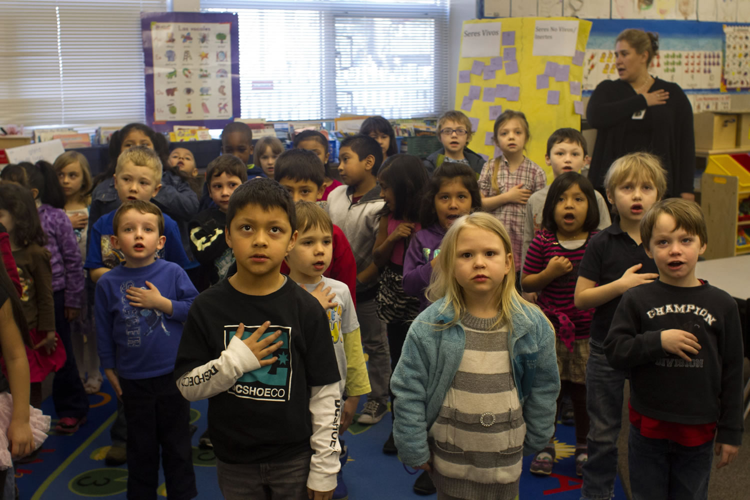 Kindergarten students at Metzger Elementary School in Tigard, Ore., start the day March 4 with the Pledge of Allegiance in Spanish.