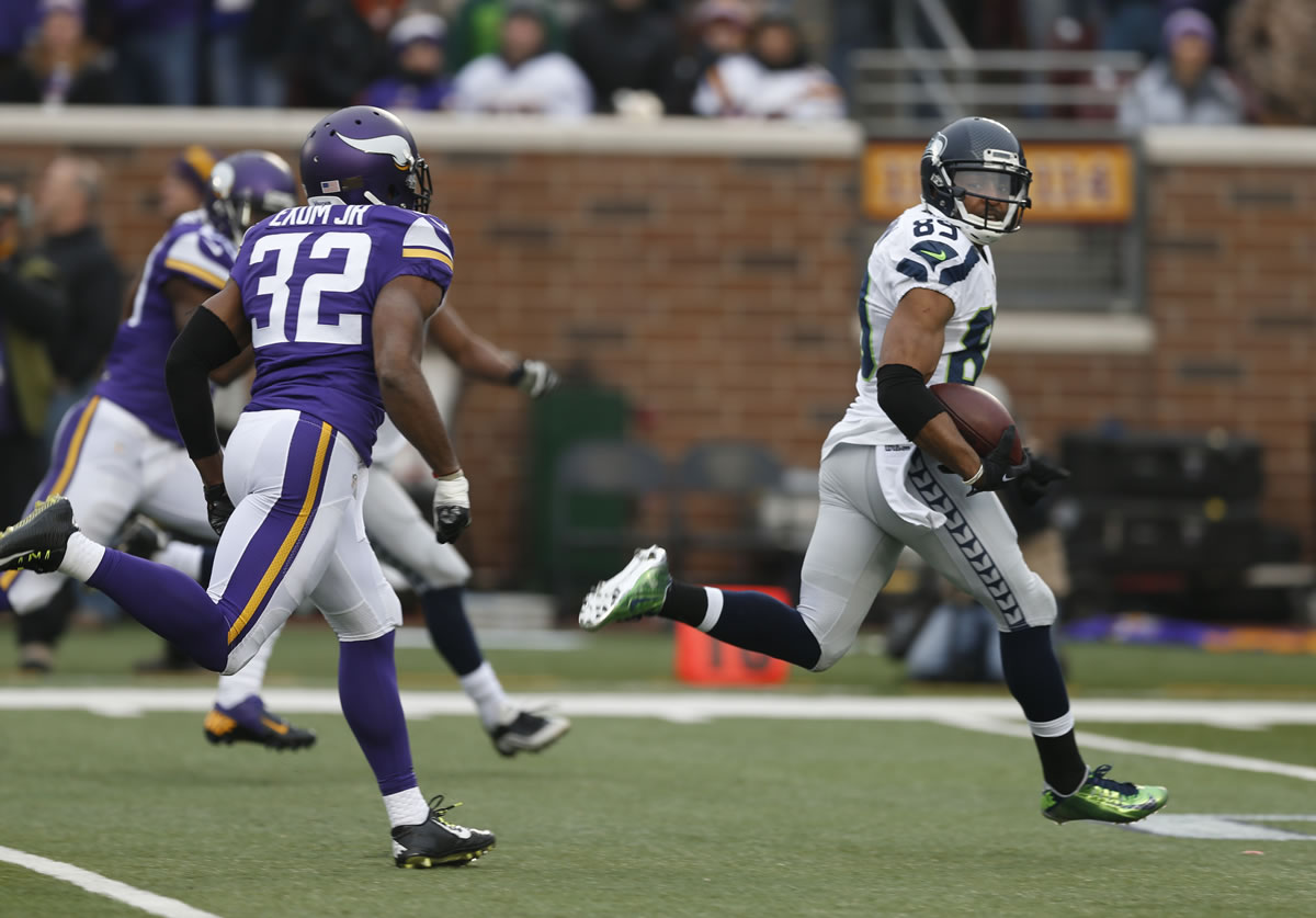 Seattle Seahawks wide receiver Doug Baldwin (89) looks back on a 53-yard touchdown reception against the Minnesota Vikings in the second half of an NFL football game Sunday, Dec. 6, 2015 in Minneapolis.