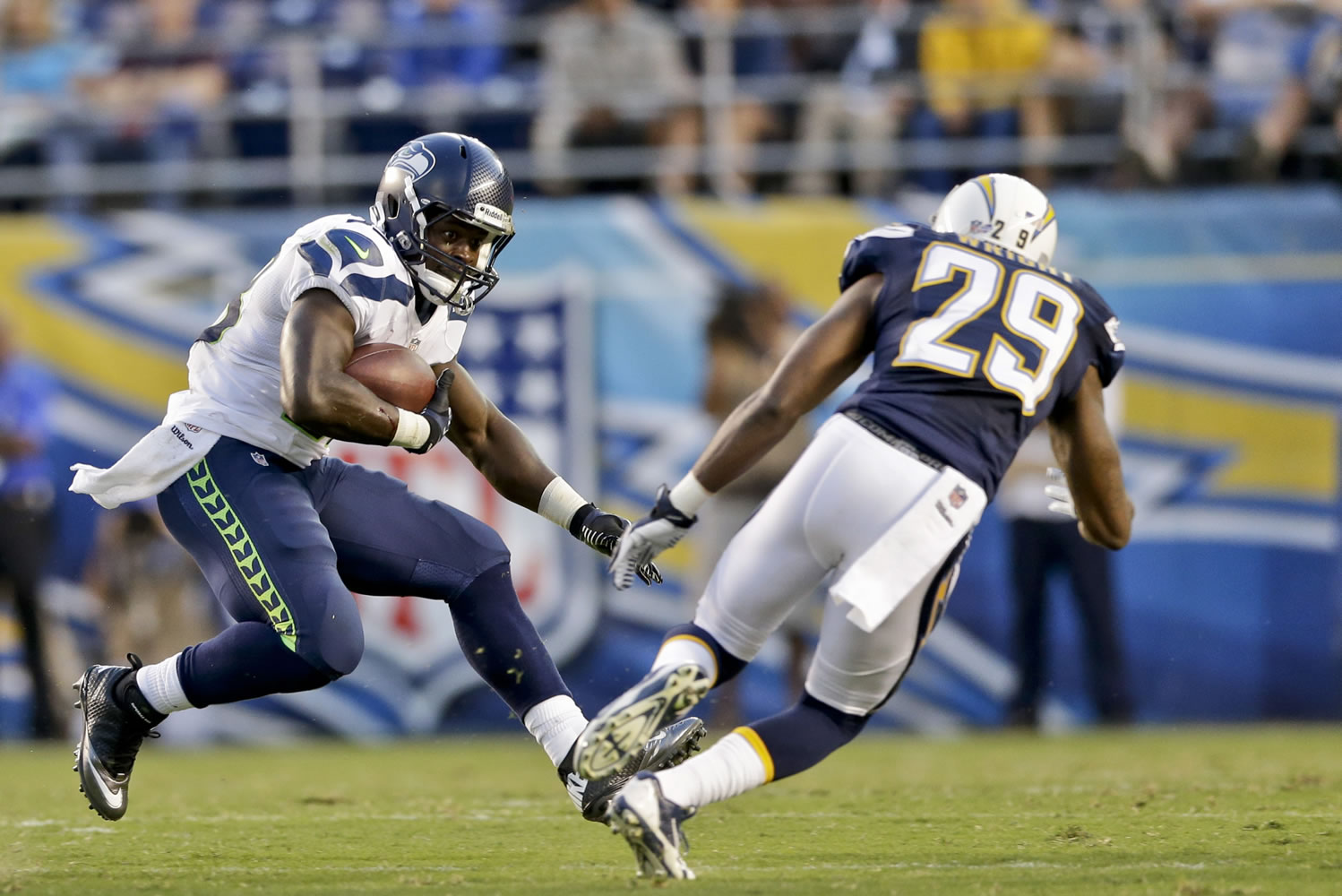Seattle Seahawks running back Christine Michael puts a move on San Diego Chargers defensive back William Middleton in the second quarter on Thursday.
