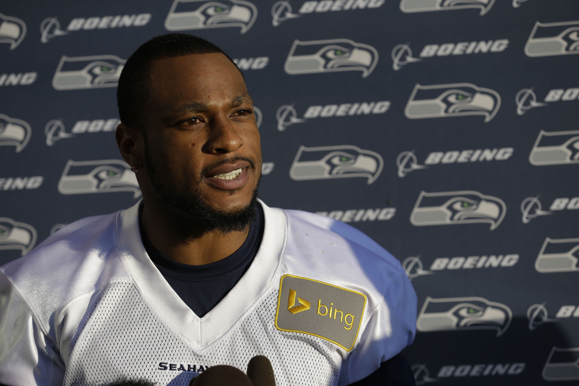 Seattle Seahawks wide receiver Percy Harvin talks to reporters following NFL football practice, Tuesday, Oct. 22, 2013, in Renton, Wash. It was Harvin's first full team practice since he injured his hip during the off-season. (AP Photo/Ted S.