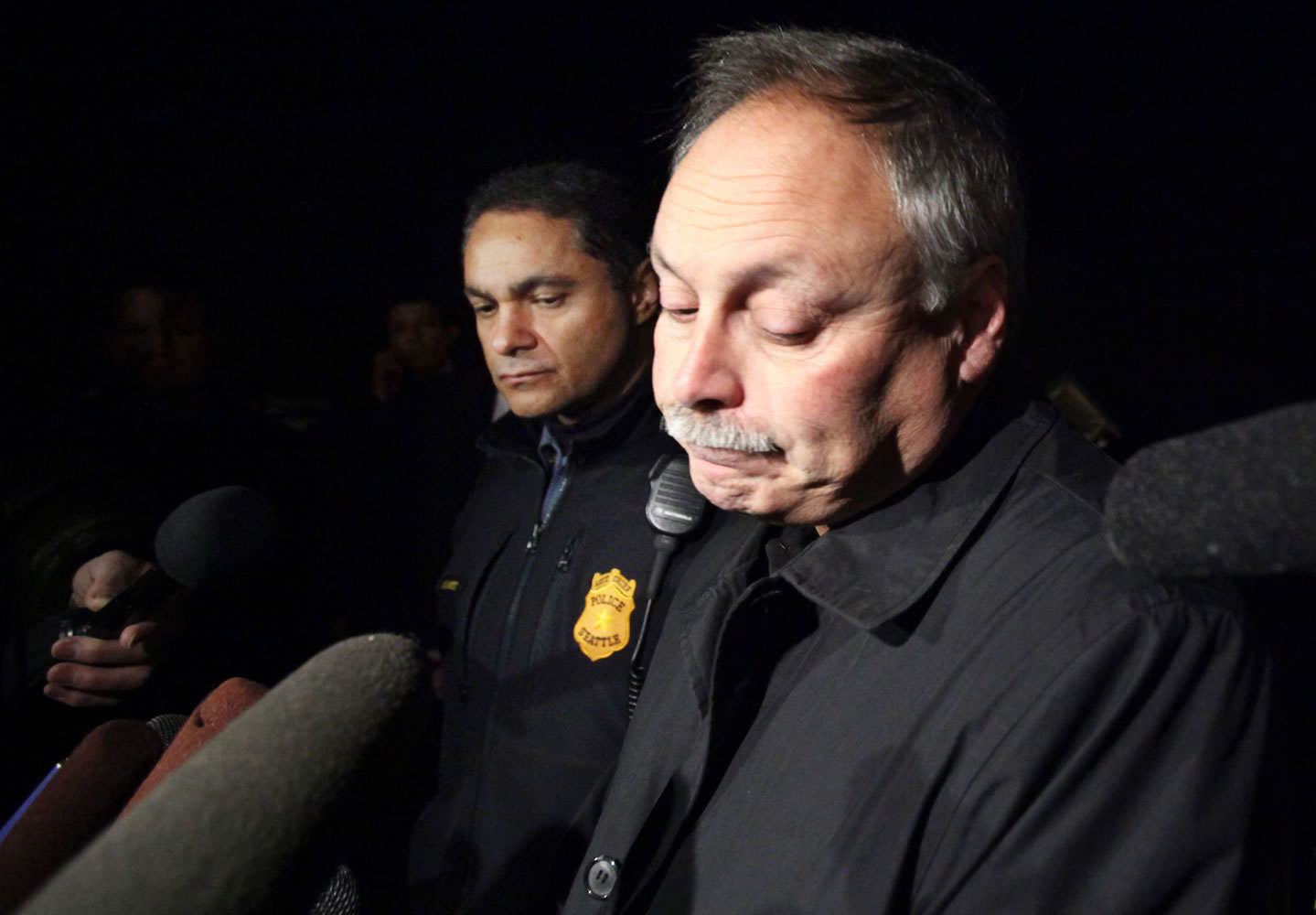 Seattle Police chief John Diaz, right, during a news briefing with assistant chief Nick Metz, left, in Seattle.